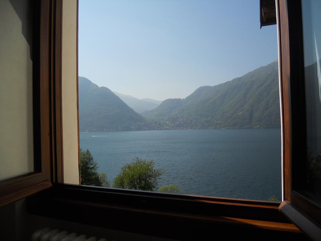 The Silence Holiday Apartment Lezzeno Bagian luar foto